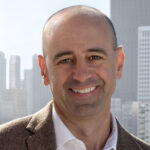 Glen smiles in his headshot